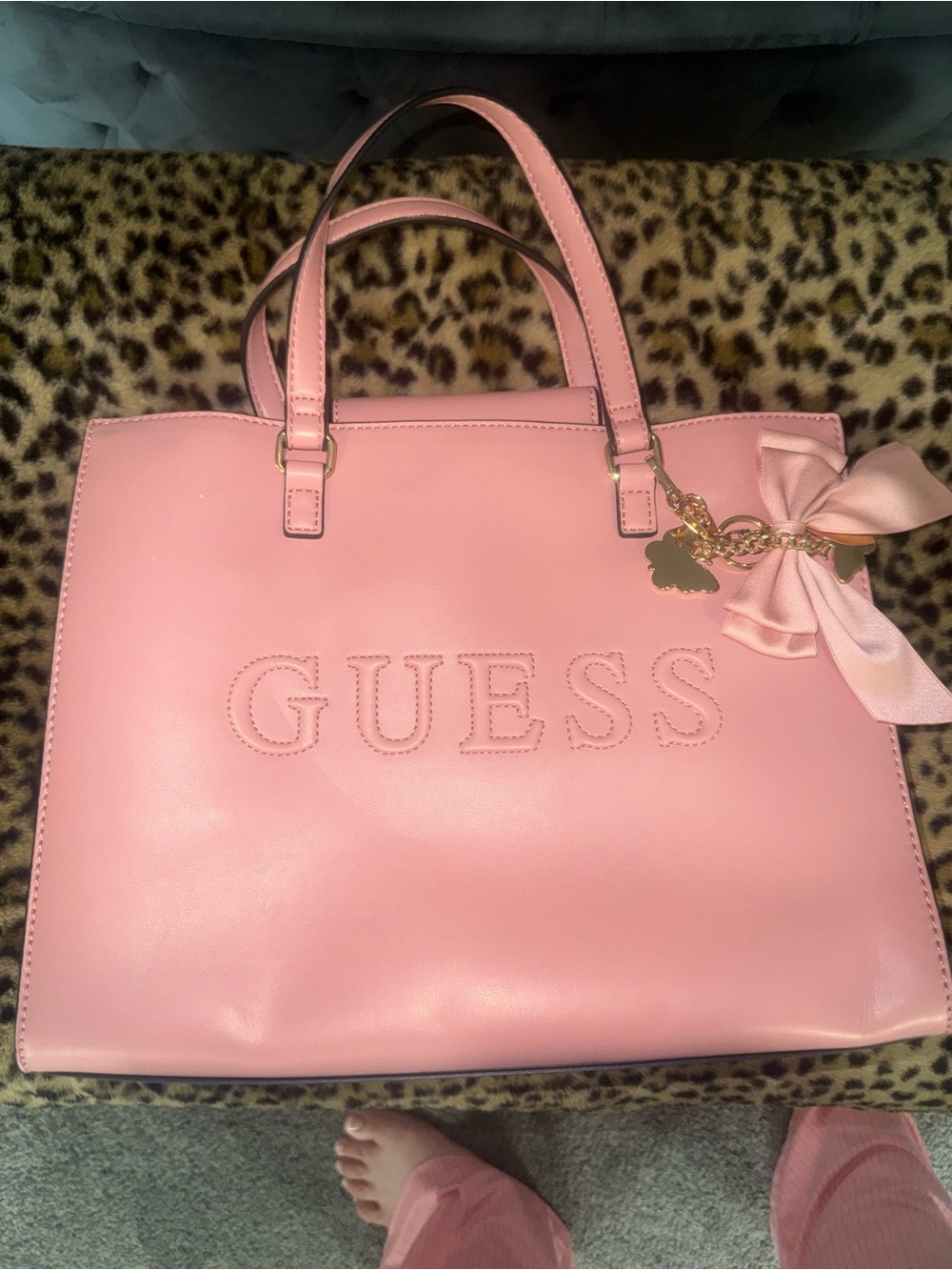 GUESS Pink Tote with Logo Embossing and Bow Charm